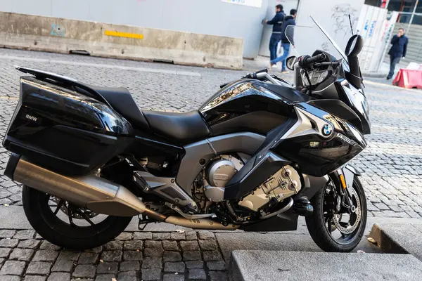stock image Oporto, Portugal - November 23, 2023: BMW K 1600 GT black motorcycle parked on a street in Oporto, Portugal