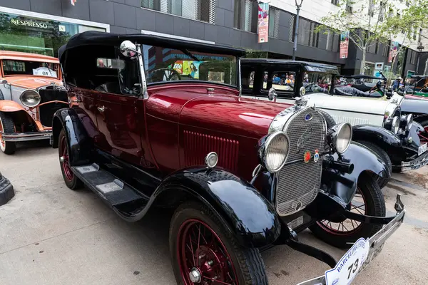 stock image Barcelona, Spain - April 6, 2024: Old retro garnet car from the 1920s of the brand Ford parked on a street in Barcelona, Catalonia, Spain