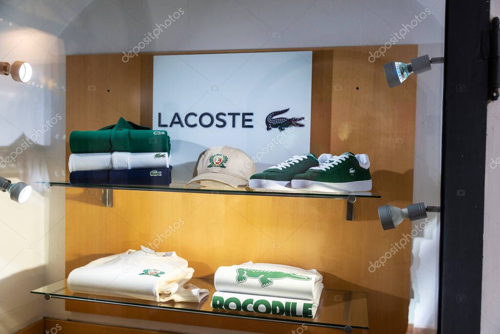 Salzburg, Austria - April 2, 2025: Display of Lacoste, luxury clothing store in a shopping street in Salzburg, Austria