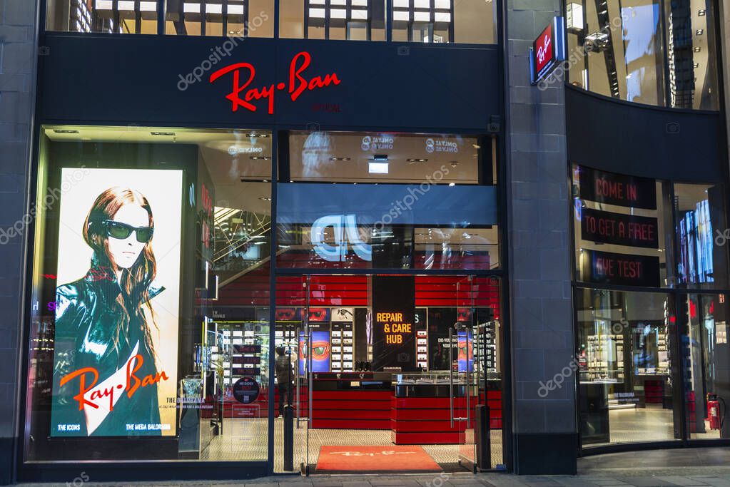 Munich, Germany - April 3, 2025: Display of Ray Ban, luxury shop of sunglasses, in Kaufingerstrabe, a shopping street of Munich, Germany