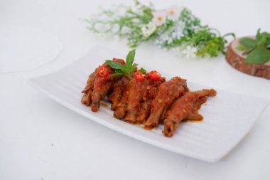 Arka plan olarak baharatlı tavuk ayağı.