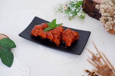 delicious spicy fried chicken as a background