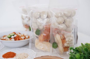 Meatballs with delicious peanut crackers as a backgrund