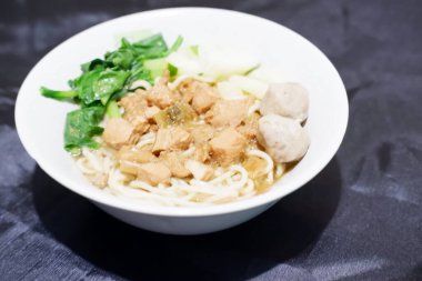 delicious meatball chicken noodle as a background