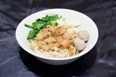 delicious meatball chicken noodle as a background