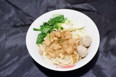 delicious meatball chicken noodle as a background