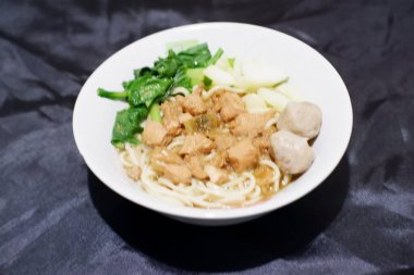 delicious meatball chicken noodle as a background