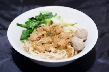 delicious meatball chicken noodle as a background