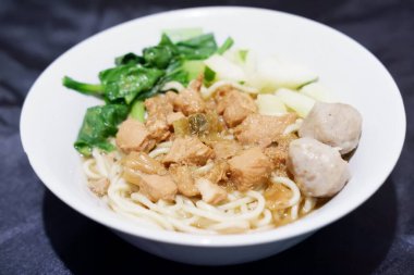 delicious meatball chicken noodle as a background