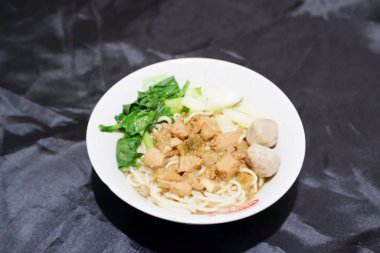 delicious meatball chicken noodle as a background