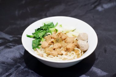 delicious meatball chicken noodle as a background