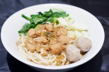 delicious meatball chicken noodle as a background