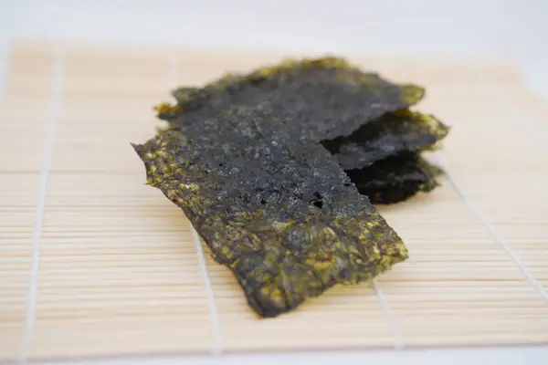 Dried seaweed on a bamboo. Japanese food