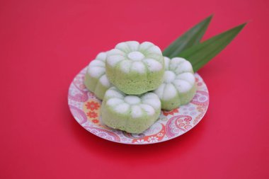 Kue Putu Ayu yumuşak bir dokusu olan geleneksel ıslak keklerden biridir.. 