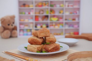 Tahu Bakso, Indonesian traditional snack made from tofu and beef. Served in white plate. clipart