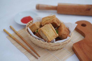 Tahu Bakso, Indonesian traditional snack made from tofu and beef. Served in rattan basket. clipart