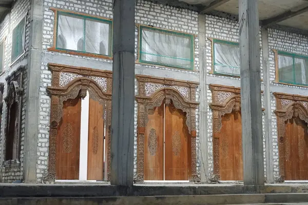 Stock image Traditional Wooden Door Frames in an Unfinished Building