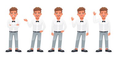 Küçük yakışıklı bir çocuk kollarını kavuşturmuş, bir şeyi işaret ediyor, elini sallıyor, tamam işareti gösteriyor. Sevimli beyaz bebek farklı pozlarda duruyor. Tam büyüyen adam.