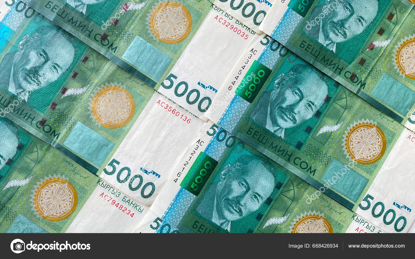 吉尔吉斯斯坦国家货币的背景5000索姆的现钞一张5000索姆的绿色钞票上面有演员Suymenkul Chokmorov的肖像这是吉尔吉斯斯坦的现钞