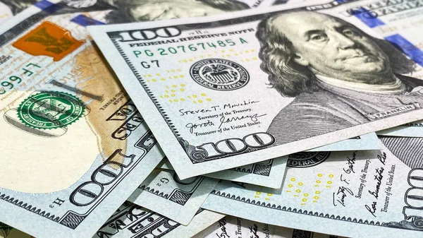 100ドルの請求書がたくさんある キャッシュバンクノート ドルマネーの背景について 100米ドル アメリカの通貨 — ストック写真