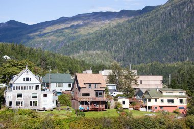 The Summer view of Ketchikan town residential wooden houses and Deer Mount in a background (Alaska).