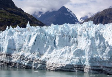 The close view of a large glacier in Glacier Bay national park (Alaska).