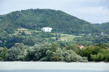 The summer view of Danube River and Wachau valley hilly landscape in Austria.