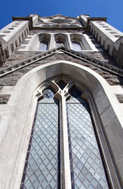 The view of historic Presbyterian Iona Church window in Port Chalmers town (New Zealand).