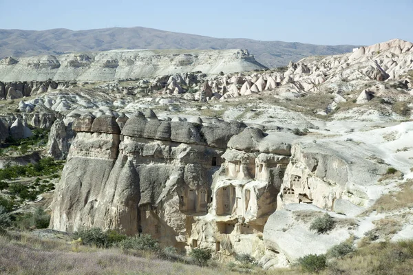 Scenic View Eroded Rocks Small Caves Carved Red Valley Cappadocia Royalty Free Stock Images