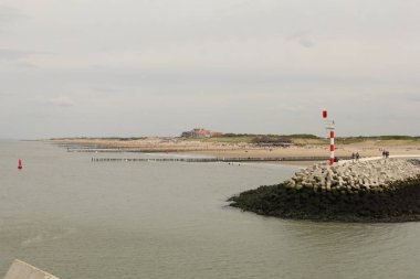 beautiful dutch coast landscape of cadzand in sealand with a broad sand beach between the sea and the natural dunes