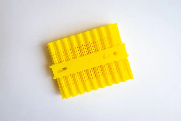 Group Yellow Plastic Raw Plug Anchor Supports Front View Isolated — Stock Photo, Image