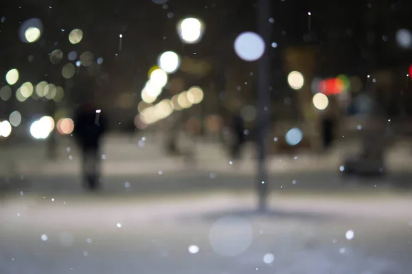Fondo Borroso Vista Ciudad Luces Nieve Cayendo Noche Calle Bokeh —  Fotos de Stock
