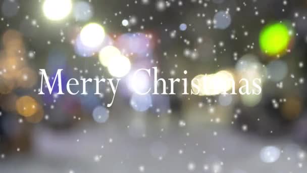 Woorden Vrolijk Kerstmis Wazige Achtergrond Van Fel Glanzende Straatlantaarns Tijdens — Stockvideo