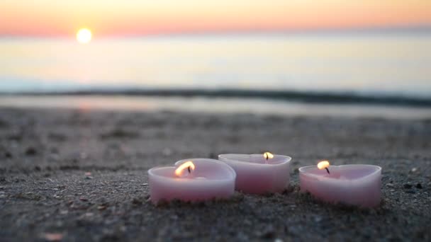 Three Candles Shape Heart Burn Sand Sea Beach Sea Waves — Wideo stockowe