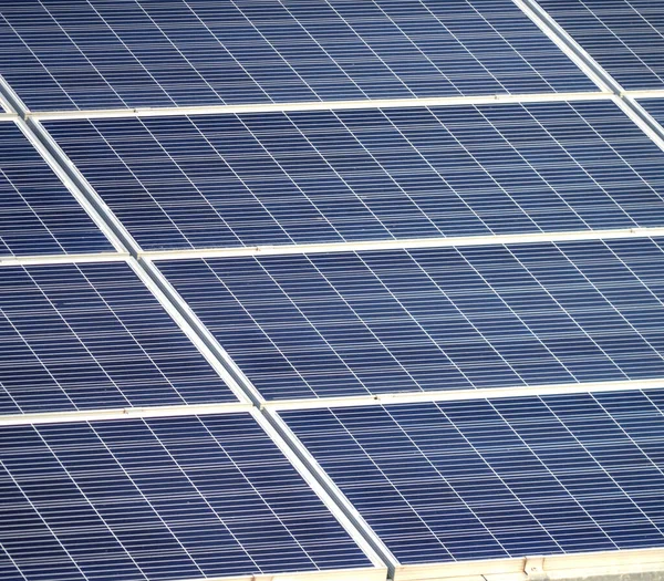 Large Solar Panels Solar Power Plants. Green energy power. Solar power energy generation. Solar Electricity Generation. Renewable energy. Blue photovoltaic panels. Production of ecological electricity