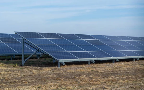 Large Solar Panels Solar Power Plants. Green energy power. Solar power energy generation. Solar Electricity Generation. Renewable energy. Blue photovoltaic panels. Production of ecological electricity