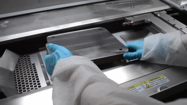 Laboratory Worker White Protective Suit Gloves Installing Metal Platform Work — Video Stock