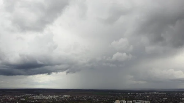 stock image The movement of rain and large rain clouds in sky. Large white gray rain clouds. Aerial drone view. Panoramic natural background. Rain. Rainy cloudy weather. Cloudscape scenic backdrop