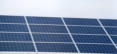 Large Solar Panels Solar Power Plants. Green energy power. Solar power energy generation. Solar Electricity Generation. Renewable energy. Blue photovoltaic panels. Production of ecological electricity