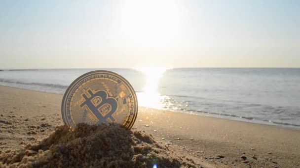 Bitcoin Btc Coin Sand Sandy Beach Sea Coast Sunny Morning — Vídeos de Stock