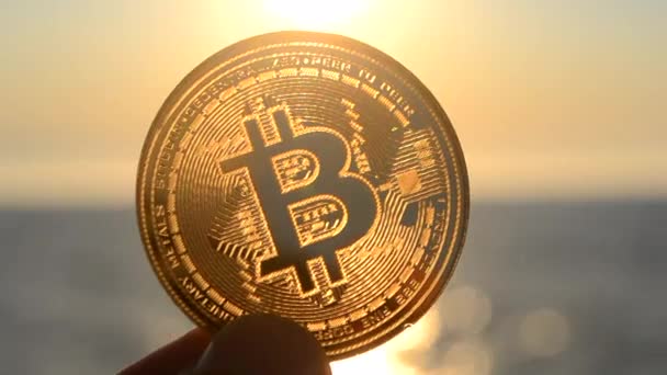 Bitcoin Coin Close Person Holding Bitcoin Coin Hand Background Sea — Αρχείο Βίντεο