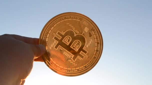 Bitcoin Coin Close Person Holding Bitcoin Coin Hand Background Blue — Vídeos de Stock