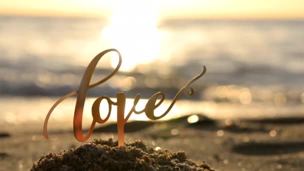 Black Outlines Word Love Dawn Sunset Background Sea Waves Seashore — Stock Video