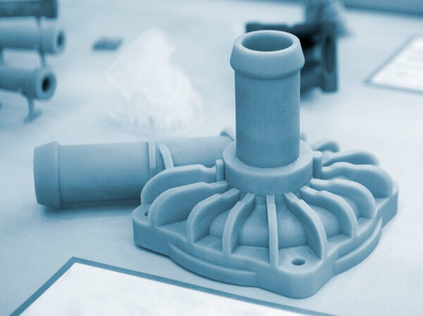 Abstract art object printed on 3D printer from photopolymer. SLA. Model 3D printed from liquid photopolymer resins. Concept progressive additive 3D printer printing technology. Sla-printing. Gray blue