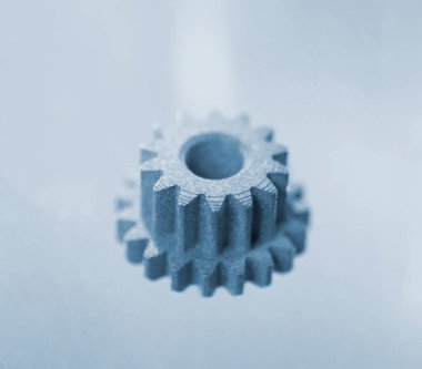 Metal madde, metal tozundan 3D yazıcıya basılmış. Metal tozundan 3D yazıcıda üretilen bir model. Metal Jet teknolojisi. Yeni modern 3D baskı teknolojileri. Katkı sağlayan yenilikçi teknoloji. Kavram