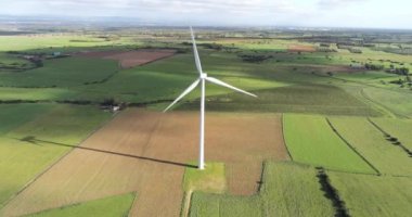 Wind turbines on a beautiful blue sky in a wind farm in the plain of southern Sardinia. Renewable energy concept, green energy generation