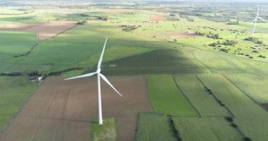 Wind turbines on a beautiful blue sky in a wind farm in the plain of southern Sardinia. Renewable energy concept, green energy generation