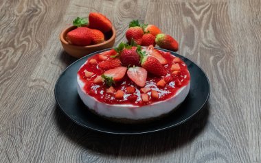 strawberry cheesecake on a dark background