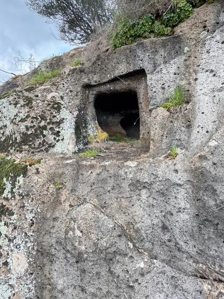 stock image Domus de Janas necropolis Partulesi Ittireddu - fairy house, prehistoric stone structure typical of Sardinia