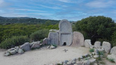 Giants' grave of S'Ena e Thomes built during the bronze age by the nuragic civilization, Doragli, Sardinia, Italy clipart
